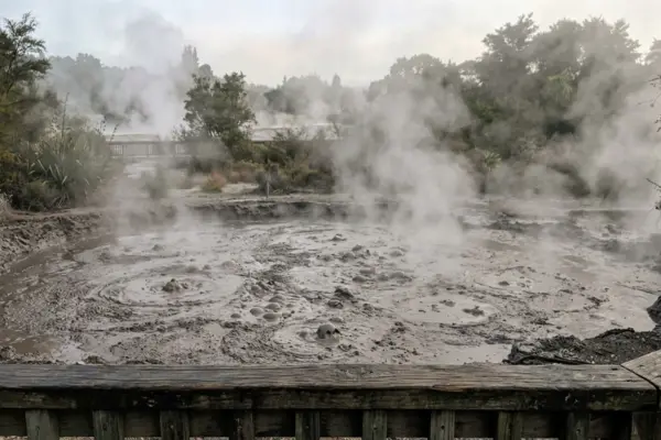mud pools bubbling steam Rotorua New Zealand